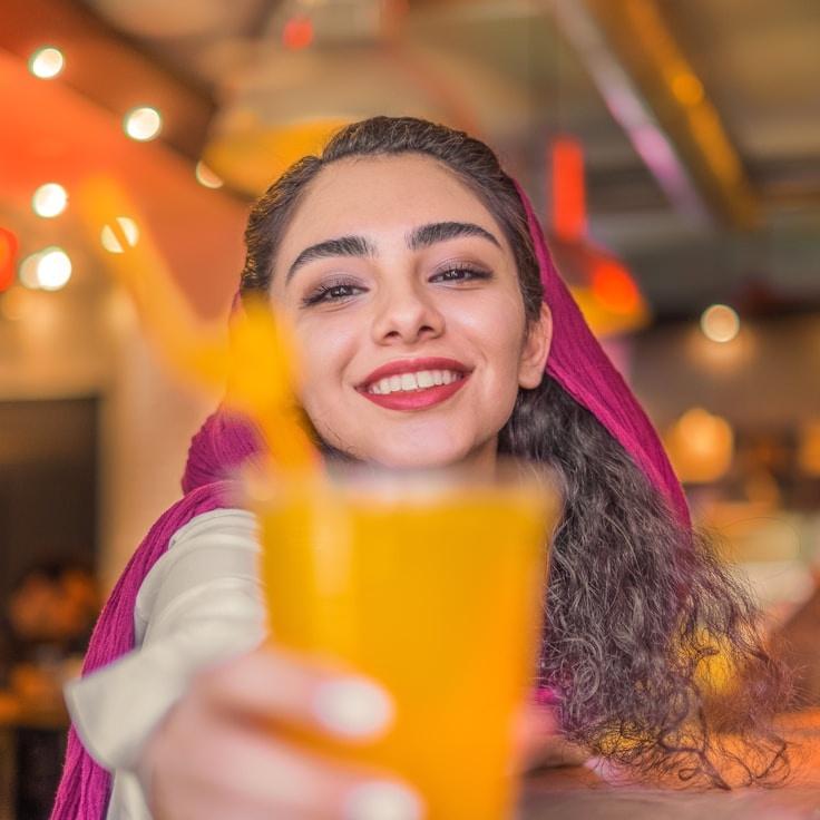 Maya Chen, Lead Design Curator at HavenNoteFaint, reviewing corporate floral arrangements